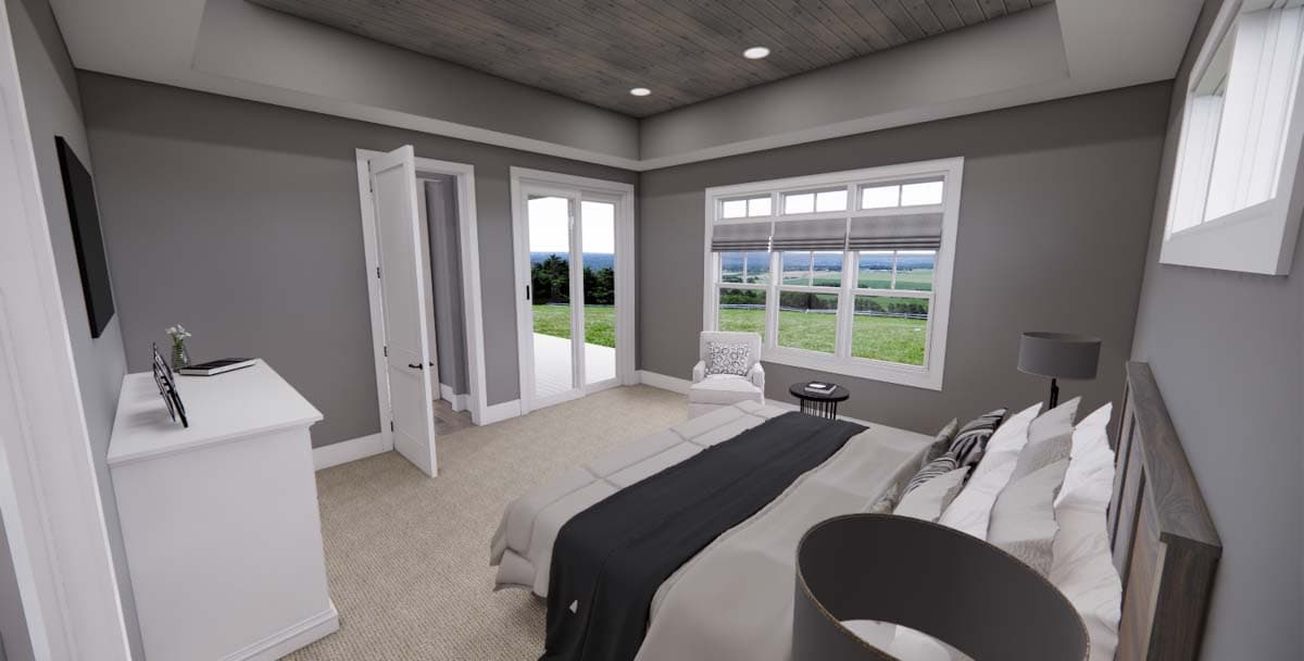 Bedroom with paneled ceiling, large window with view, and double doors leading to a deck.