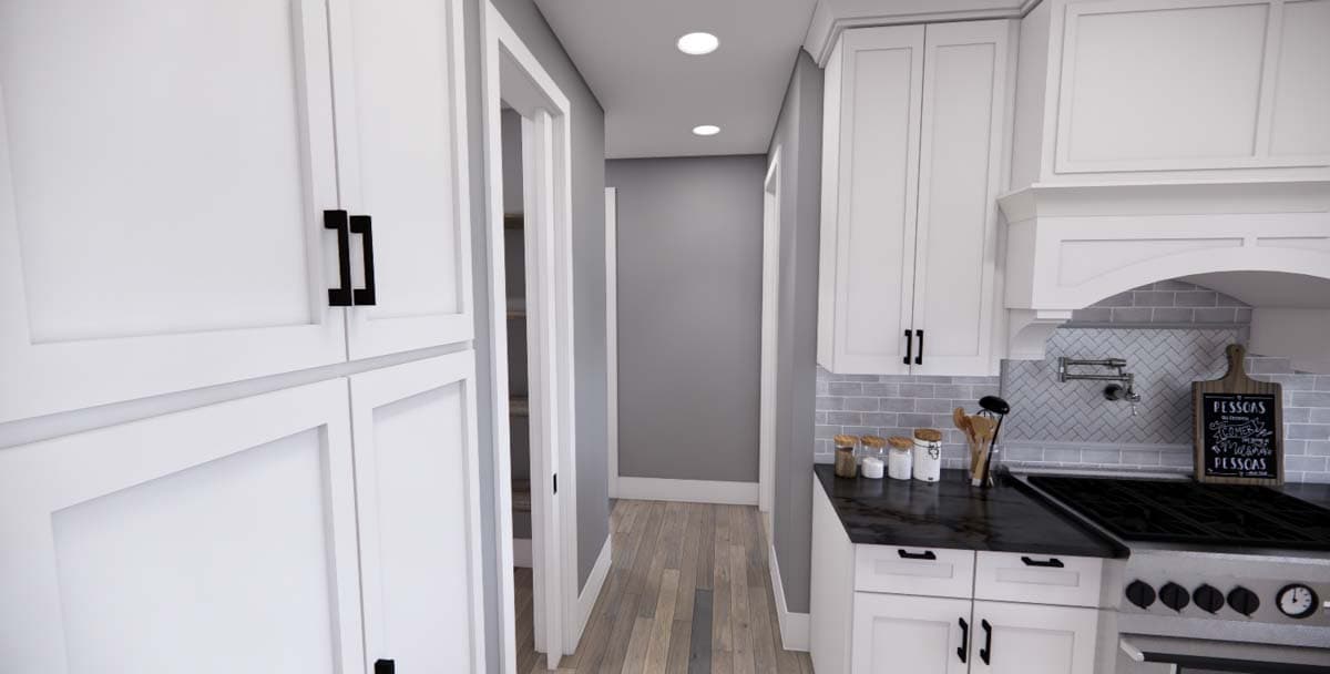 Interior rendering of a kitchen with white cabinets, dark countertop, subway tile backsplash, and a gas range.