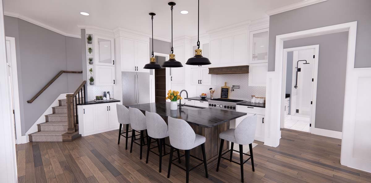 Modern kitchen with a large island, white cabinetry, stainless steel appliances, and view into a walk-in shower.