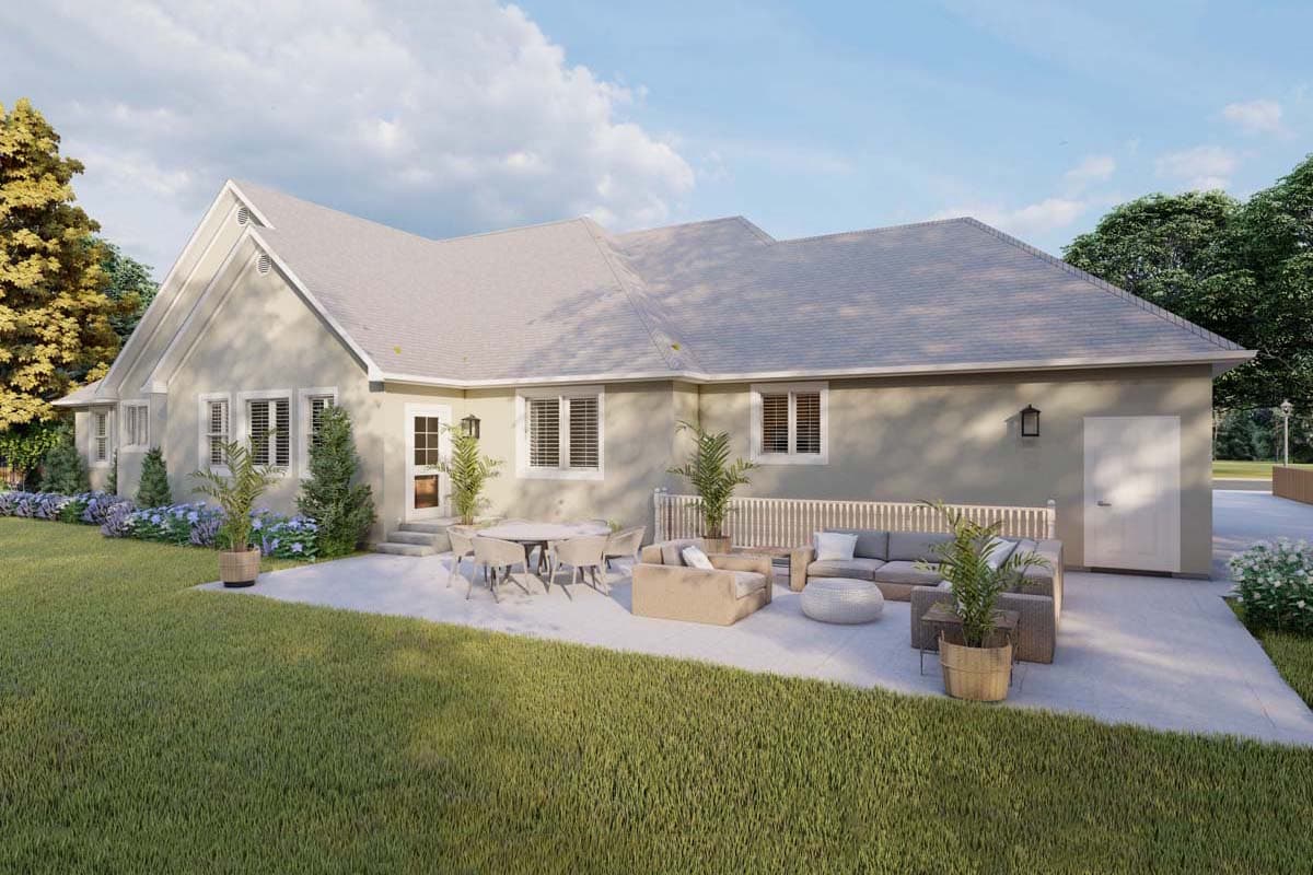 House plan exterior: single-story residence with gabled front, multiple windows, and a large patio with outdoor furniture.