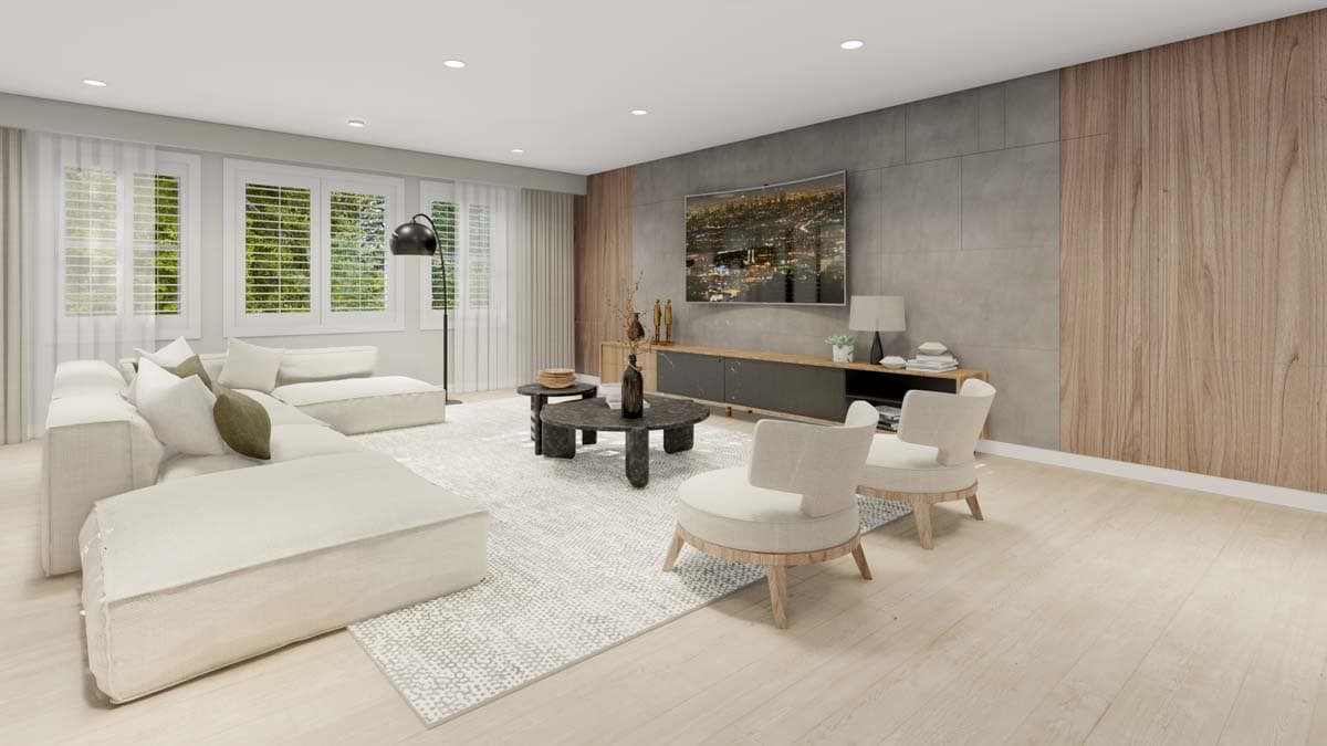 Living room with sectional sofa, media console with mounted TV, and accent wall of wood paneling and textured concrete.
