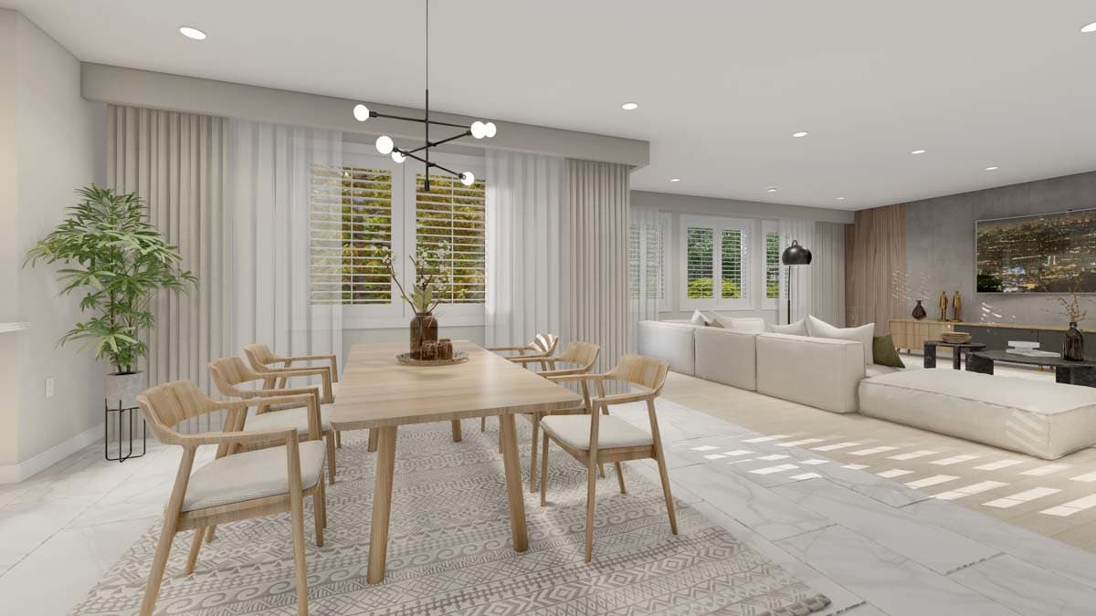 Open concept dining and living area with light wood dining set, modular sectional sofa, and entertainment console.