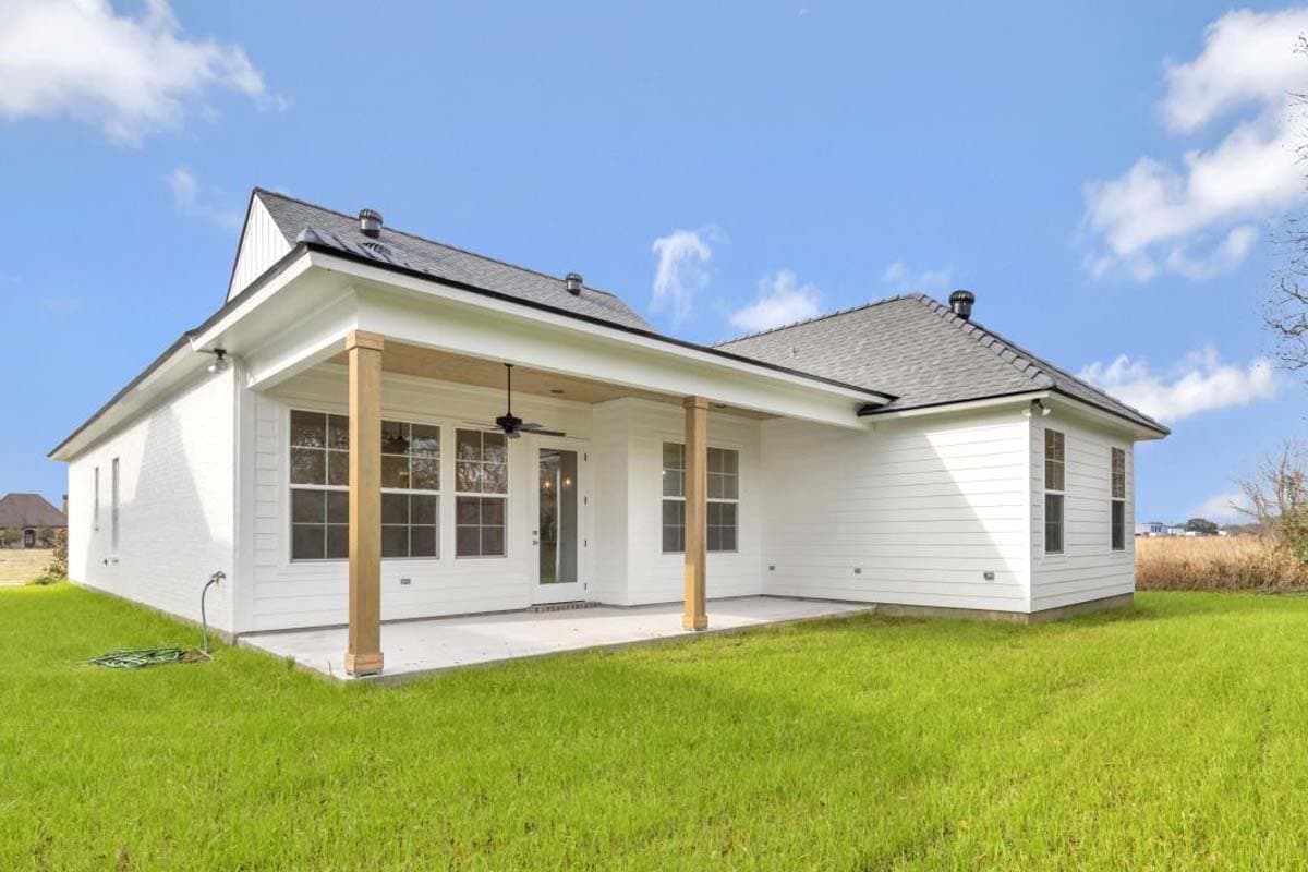 House plan exterior, modern farmhouse style, one story, covered patio with wood columns, white siding, gabled roof.