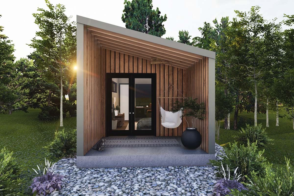 House plan exterior. Modern style with a single story, angled roof, and wood siding. Features include a covered porch and double doors.