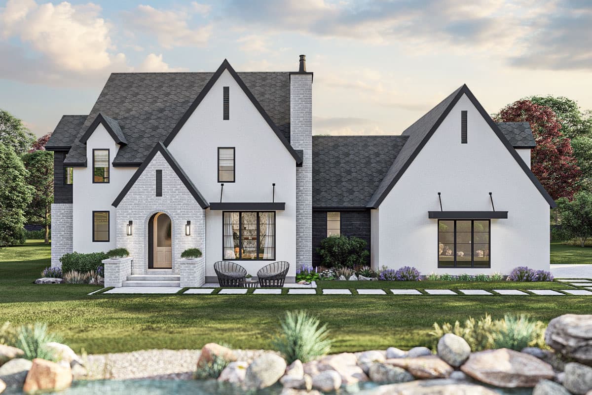 House plan exterior. Two-story Modern Farmhouse with gabled roof, brick chimney, and decorative window awnings. Features a front entry porch.