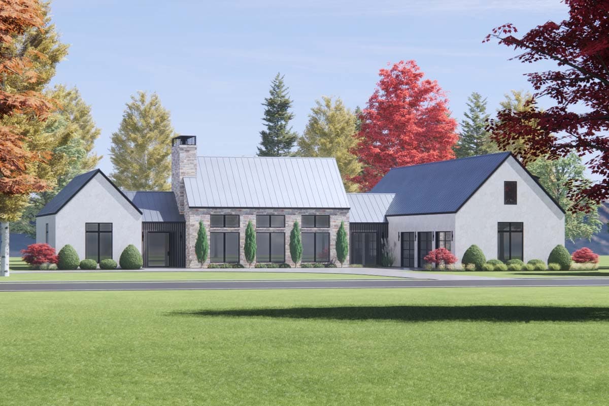 House plan exterior: Modern design with stone accent, metal roof, gabled wings, and large windows.