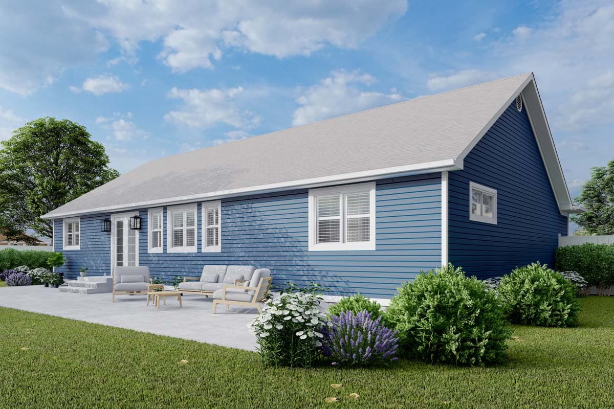 Ranch house plan exterior with blue siding, gabled roof, multiple windows, and a patio with seating.