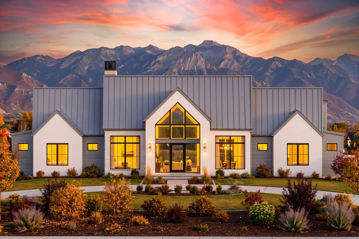 Modern Farmhouse house plan exterior with gabled entry, large windows, and standing seam metal roof.