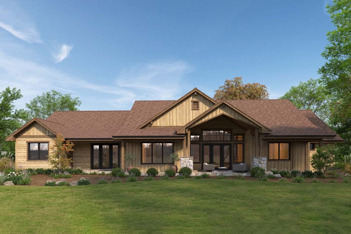 Modern Ranch house plan exterior with gable roof, wood siding, stone accents, and a large covered entry with glass doors.
