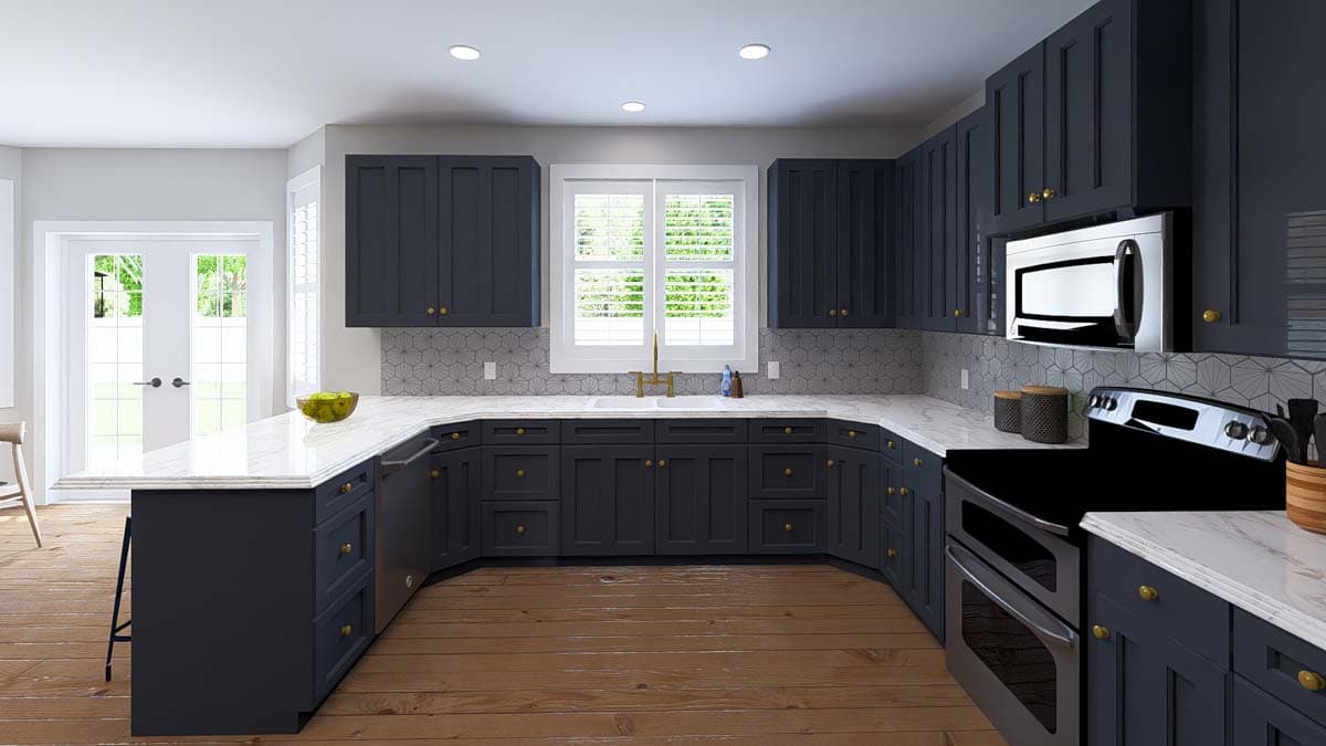 U-shaped kitchen with dark blue cabinets, white marble countertops, stainless steel appliances, and a double door leading outside.