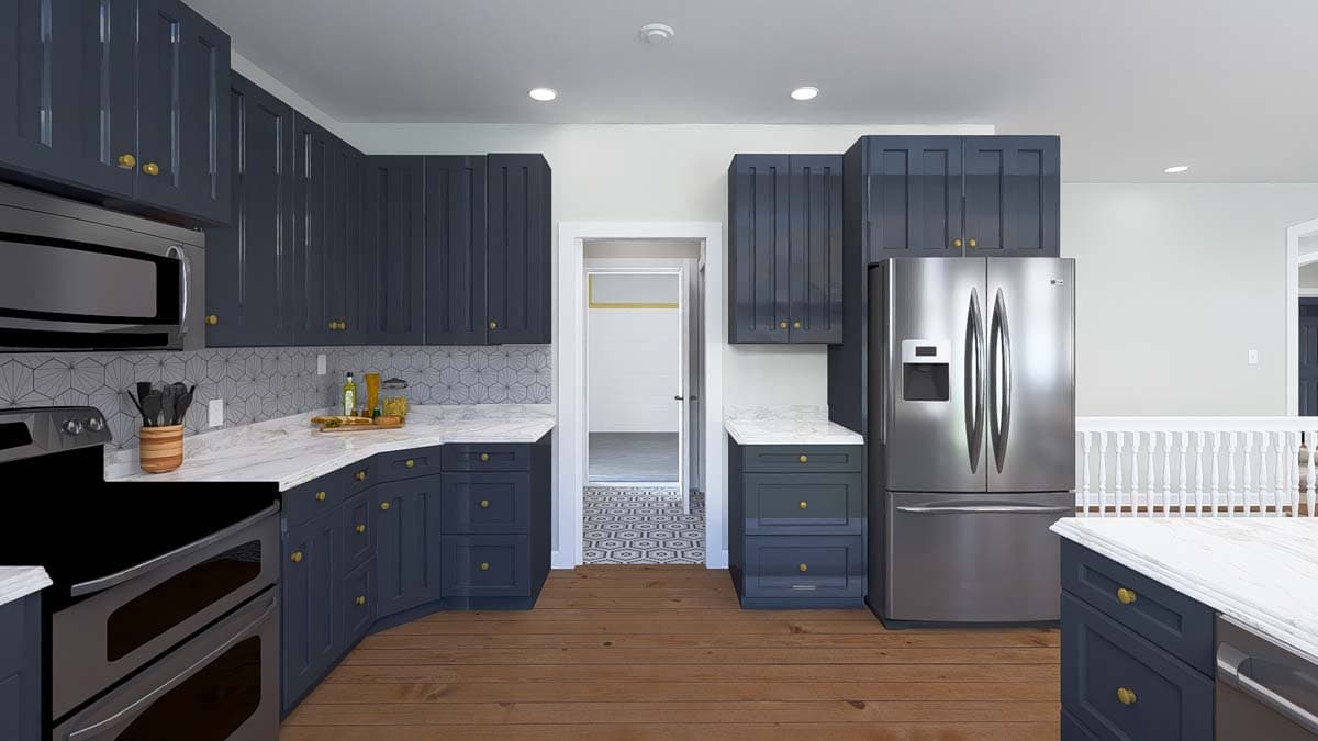 Kitchen interior with dark blue cabinets, stainless steel appliances, marble countertops, and a view into an adjacent room with patterned flooring.