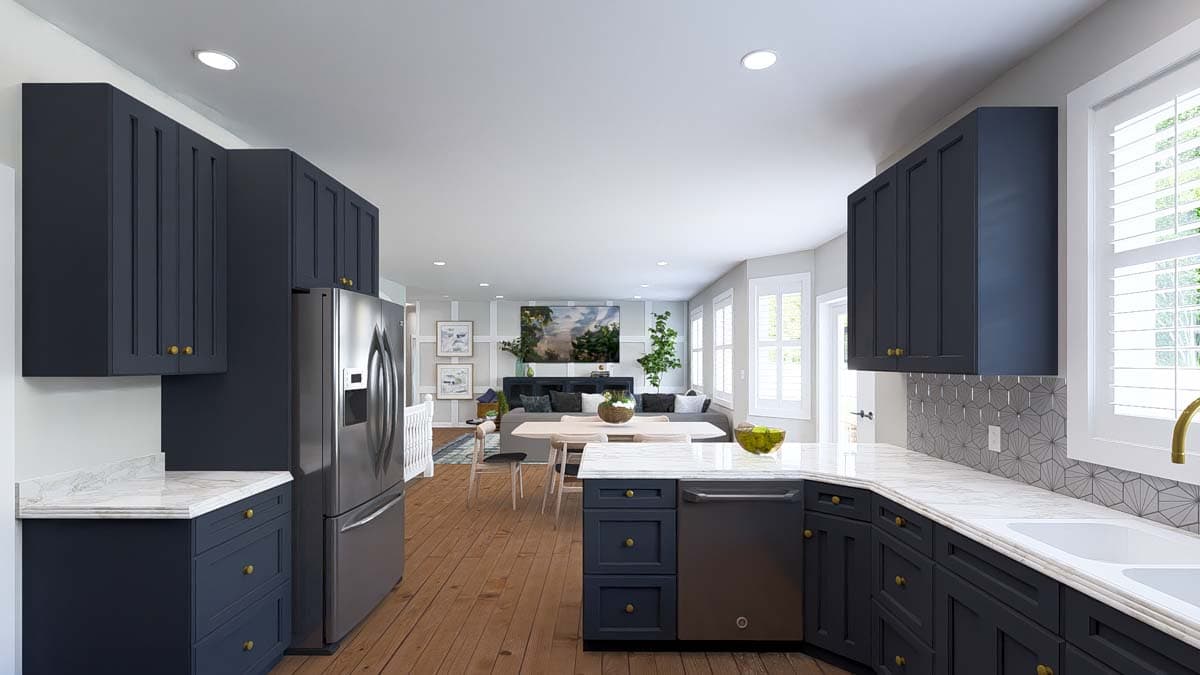 Open concept kitchen and great room featuring dark blue cabinetry, stainless steel appliances, dining area, and living space with fireplace.