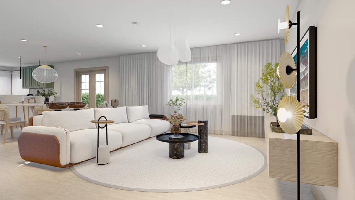 Living room with sectional sofa, modern coffee tables, large round rug, and adjoining kitchen with island.