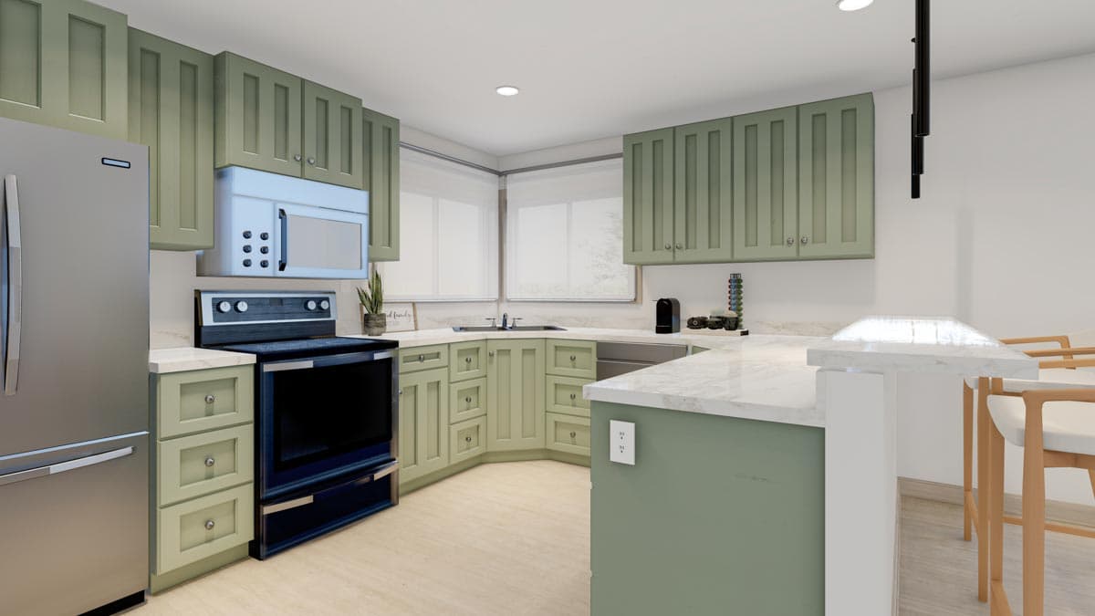 Kitchen with sage green cabinetry, stainless steel refrigerator, range, microwave, and island with seating.