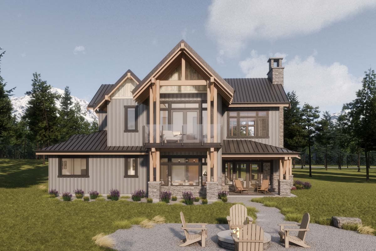 Modern mountain house plan exterior with timber framing, stone accents, metal roof, and upper balcony.