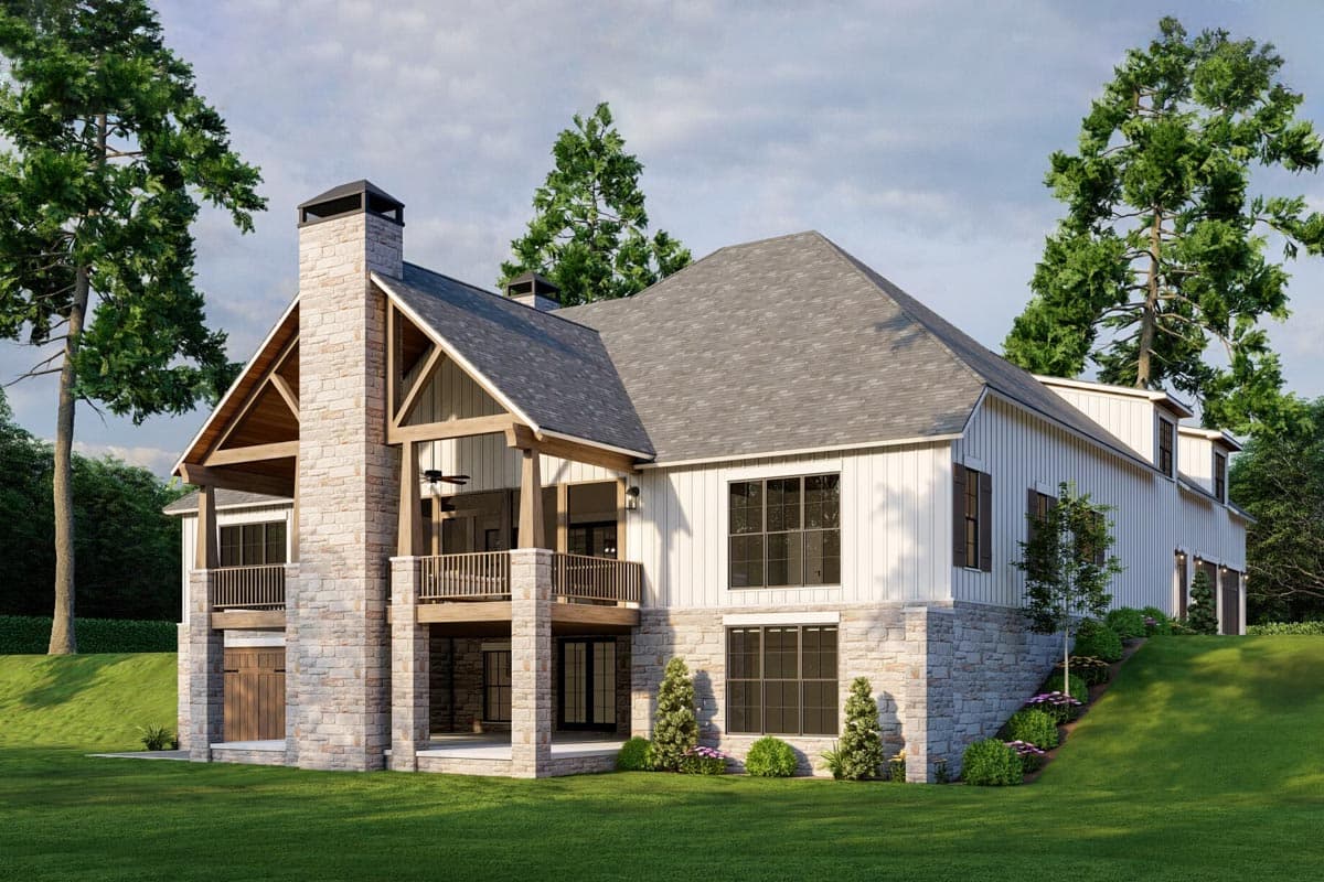House plan exterior featuring stone chimney, gable roofs, board and batten siding, and covered balconies.