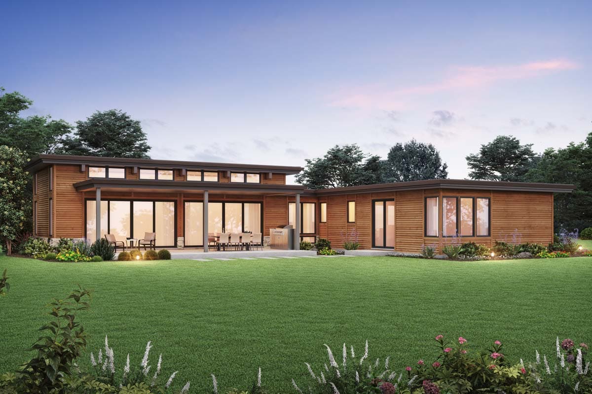 Modern house plan exterior with wood siding, flat roof, and large sliding glass doors opening to a patio.