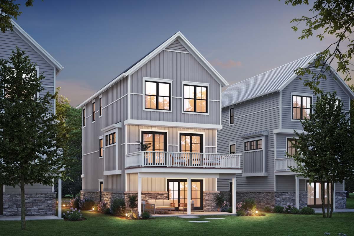 Modern Farmhouse house plan exterior, three stories, with board and batten siding, balconies, and stone accents.