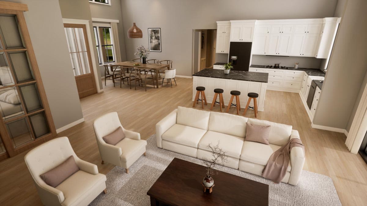 Open concept living, dining, and kitchen area with a large sofa, island, and dining table.