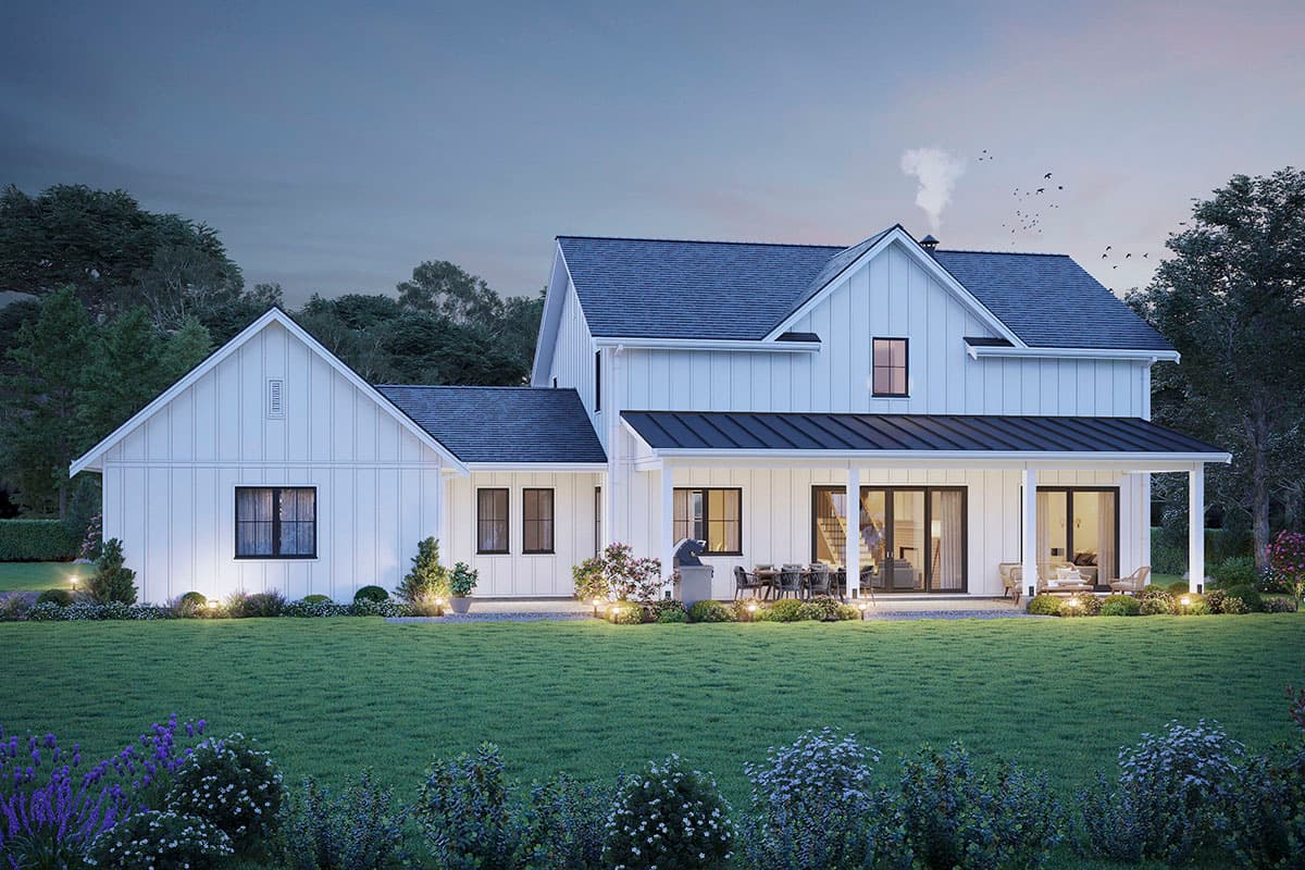 Modern Farmhouse house plan exterior with white board and batten siding, dark metal roof, and covered porch with seating.