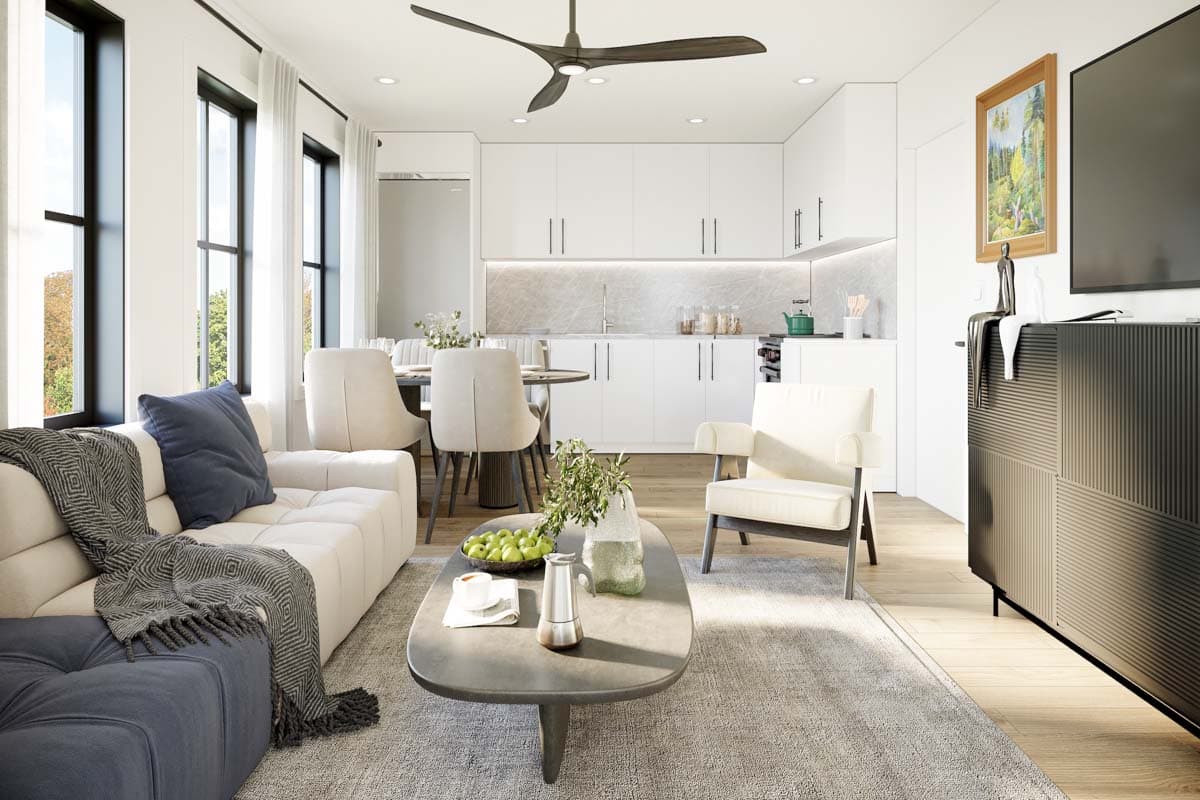 Open concept living area with sofa, dining table, and modern white kitchen featuring an island and ample cabinetry.