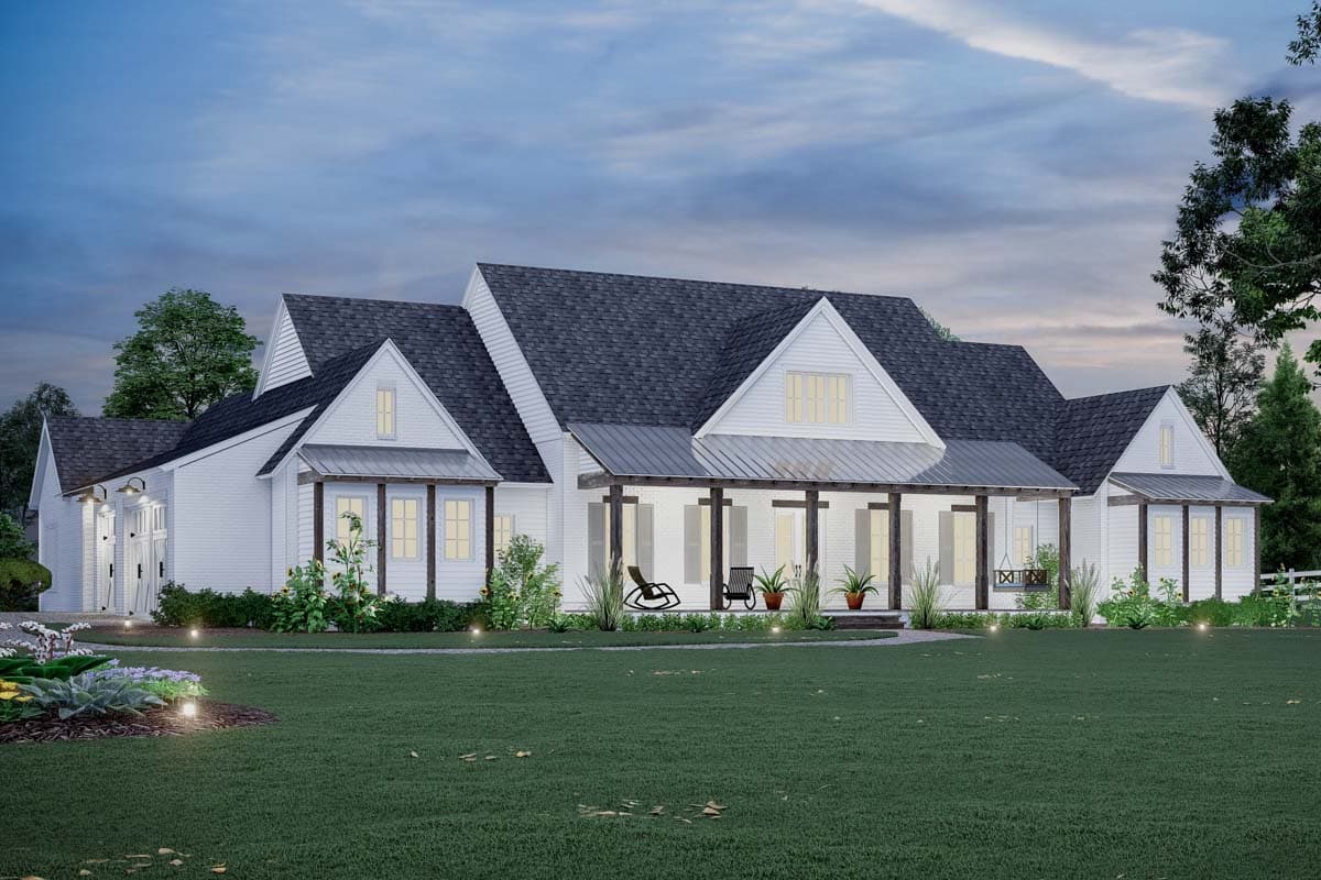 Modern Farmhouse house plan exterior with a long wraparound porch, multiple gables, and metal roof accents.