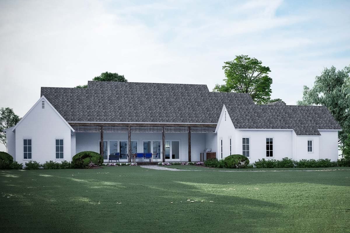 Modern Farmhouse house plan exterior, one story, with gabled ends, a covered porch, and multiple windows.