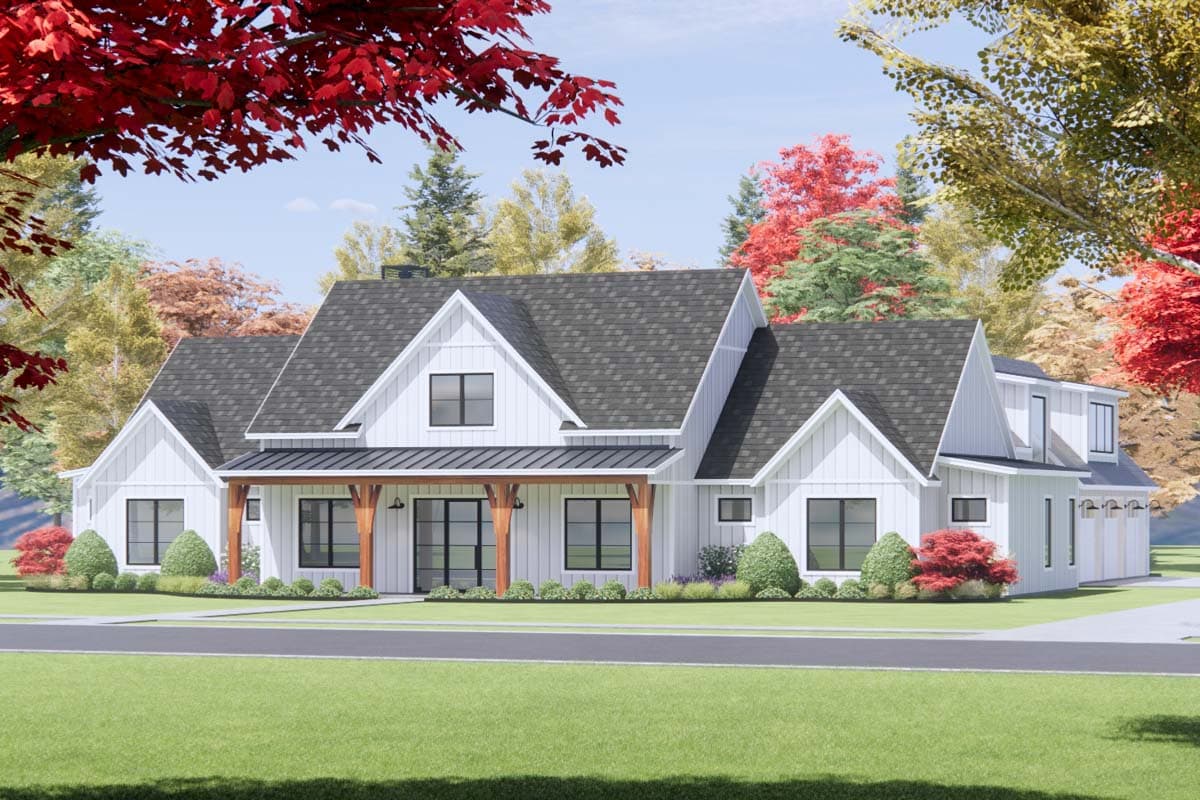 Modern Farmhouse house plan exterior, two stories, with gabled dormers, a covered porch with wooden posts, and a three-car garage.