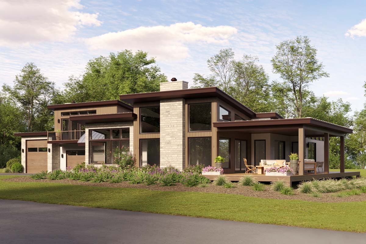 Modern house plan exterior with multiple gables, large windows, a covered porch, and a two-car garage.