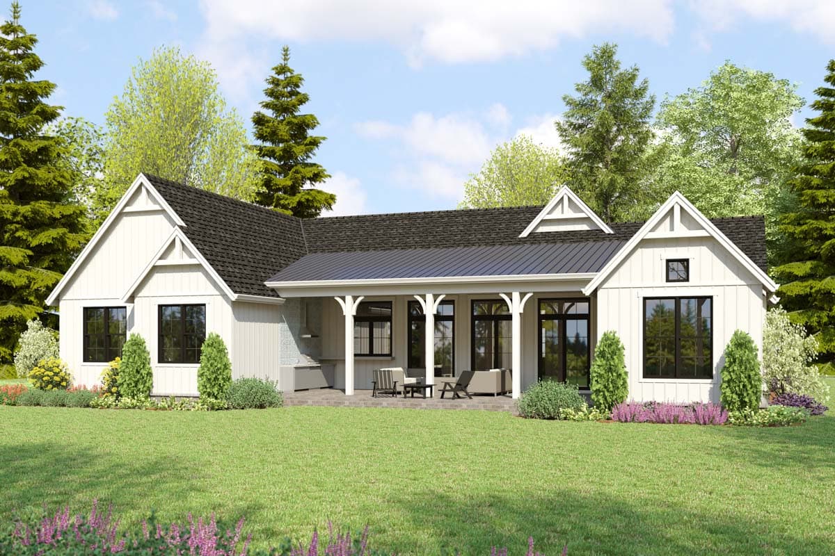 House plan exterior: Modern Farmhouse style, one story, with gabled dormers, covered porch with decorative posts, and metal roof.