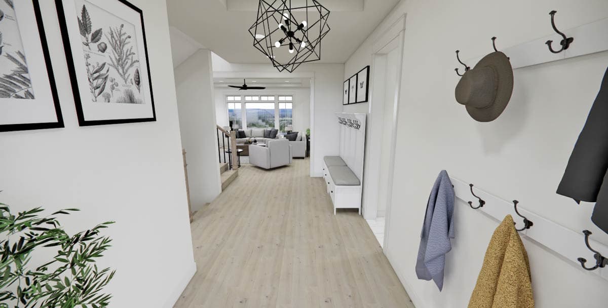 A bright, modern entryway with a bench and coat rack. A geometric chandelier hangs above the hallway leading to a living room with large windows.