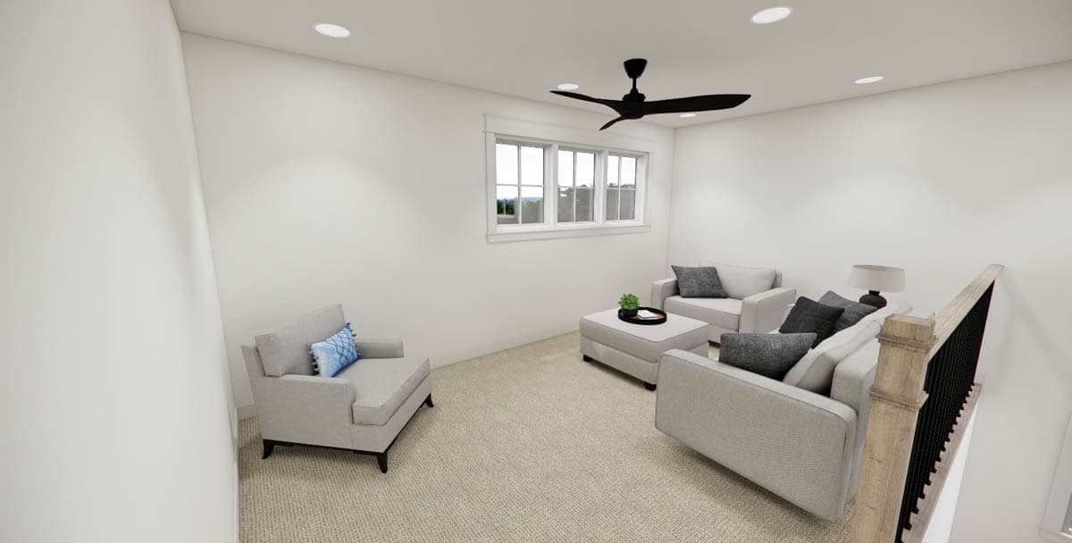 A modern, minimalist sitting area featuring neutral-toned furniture and a ceiling fan, with a window offering a view of greenery.