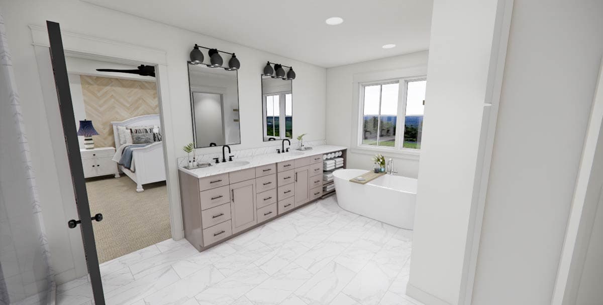 Spacious, modern bathroom with a double vanity, large mirrors, a freestanding tub, and a view of the outside through a window.