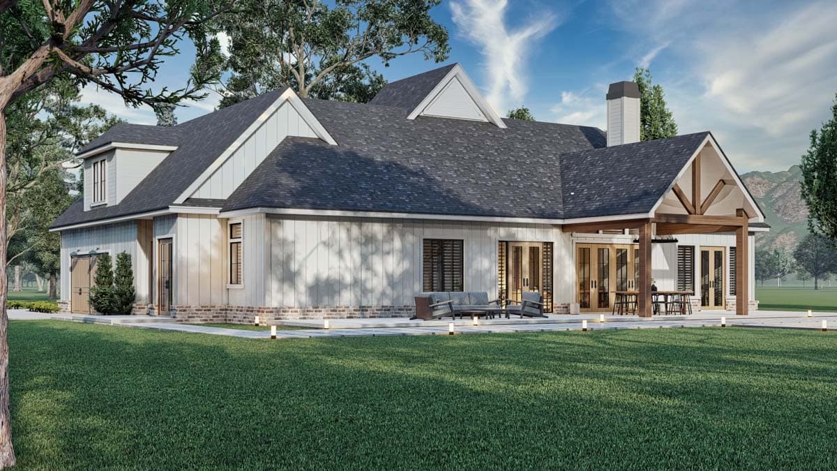 House plan exterior, two stories, gabled dormer, wood siding, covered patio with exposed beams, and attached garage.