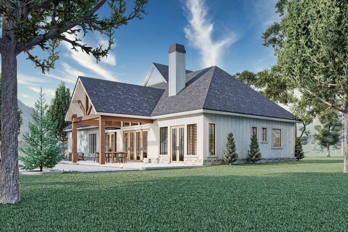 Modern Farmhouse house plan exterior, 1.5 stories, with a covered porch, large gables, and a prominent chimney.
