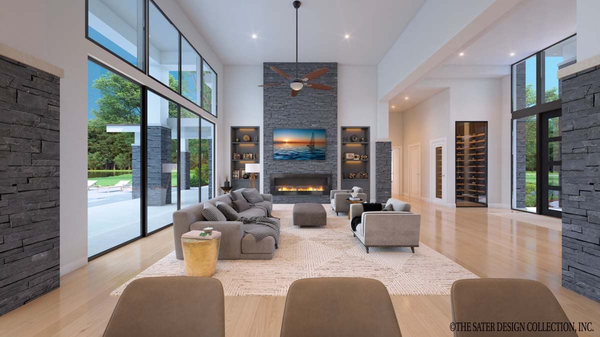 Modern living room with floor-to-ceiling windows, a stone fireplace, built-in shelves, and a wine cellar.