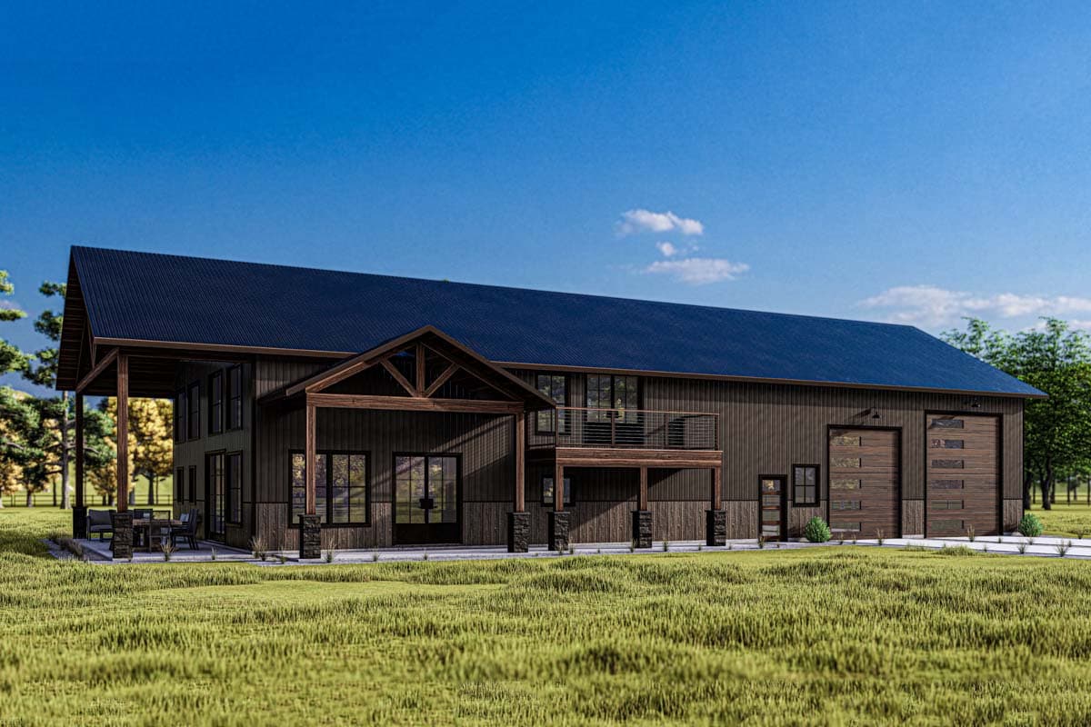 Modern farmhouse house plan exterior with dark siding, metal roof, covered porch, upper balcony, and two garage doors.
