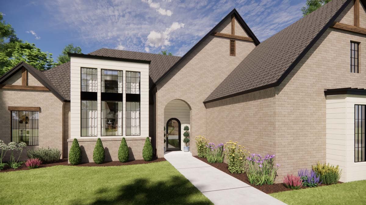 House plan exterior with brick facade, arched entryway, and tall multi-pane windows.