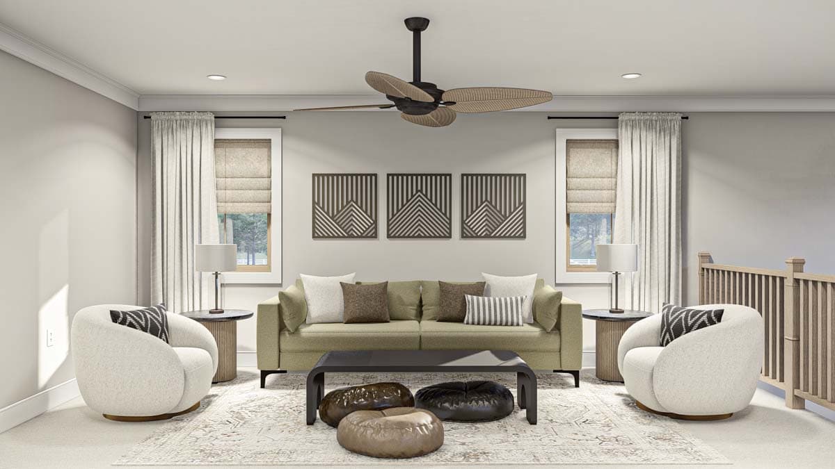 Living room with sofa, two armchairs, coffee table, and decorative wall art.