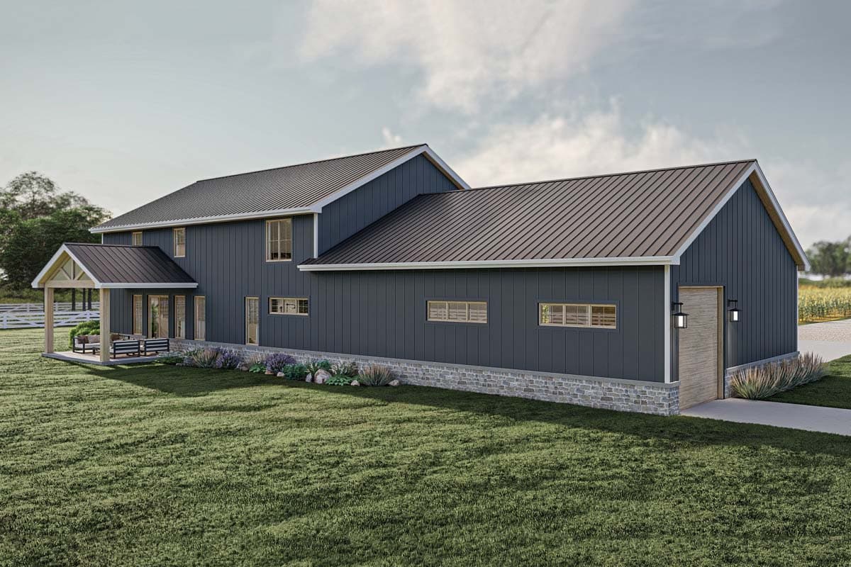 House plan exterior: Two-story Modern Farmhouse with a covered porch, metal roof, and stone foundation.