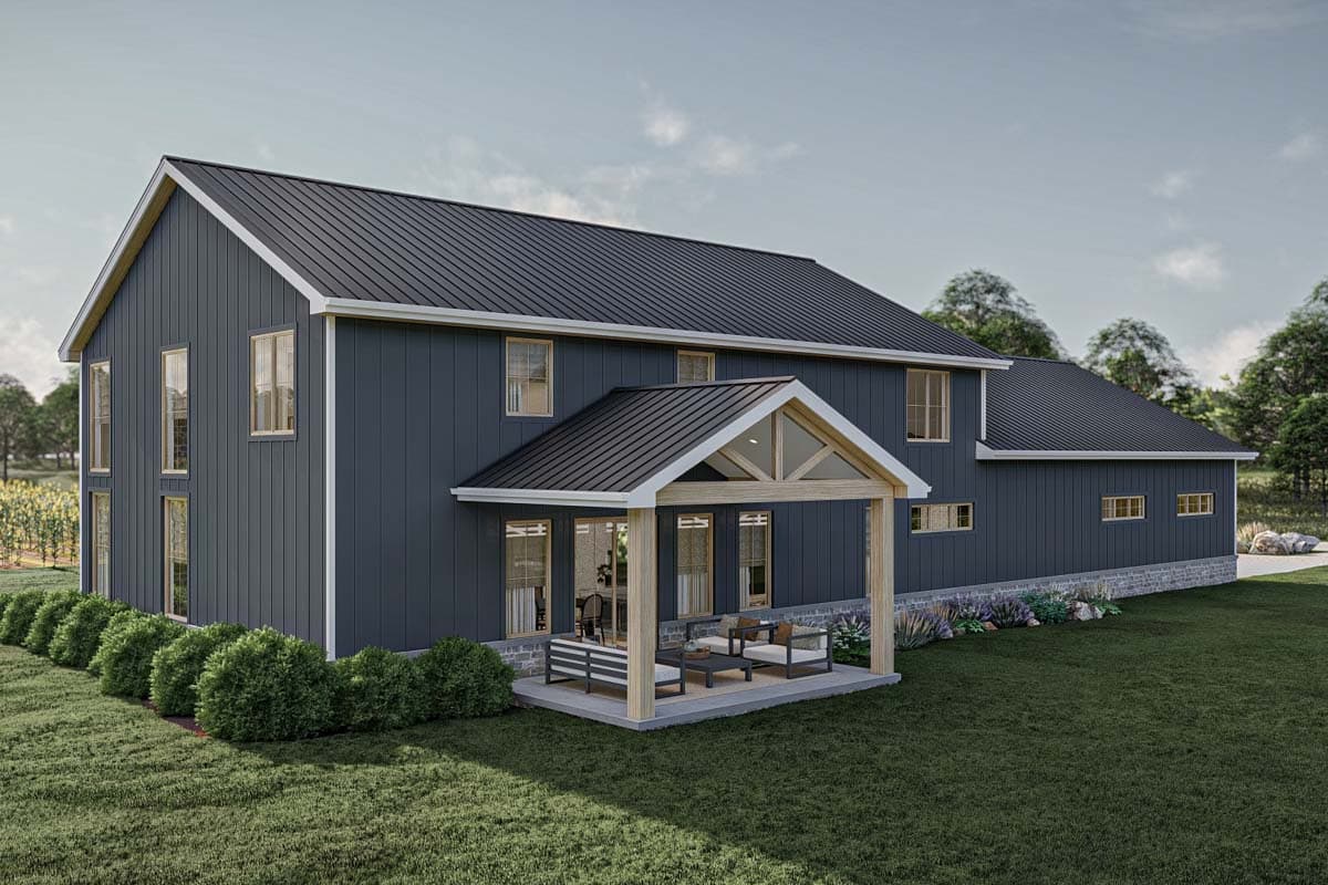 Two-story house plan exterior with vertical siding, metal roof, and a gable roof porch with exposed beams.