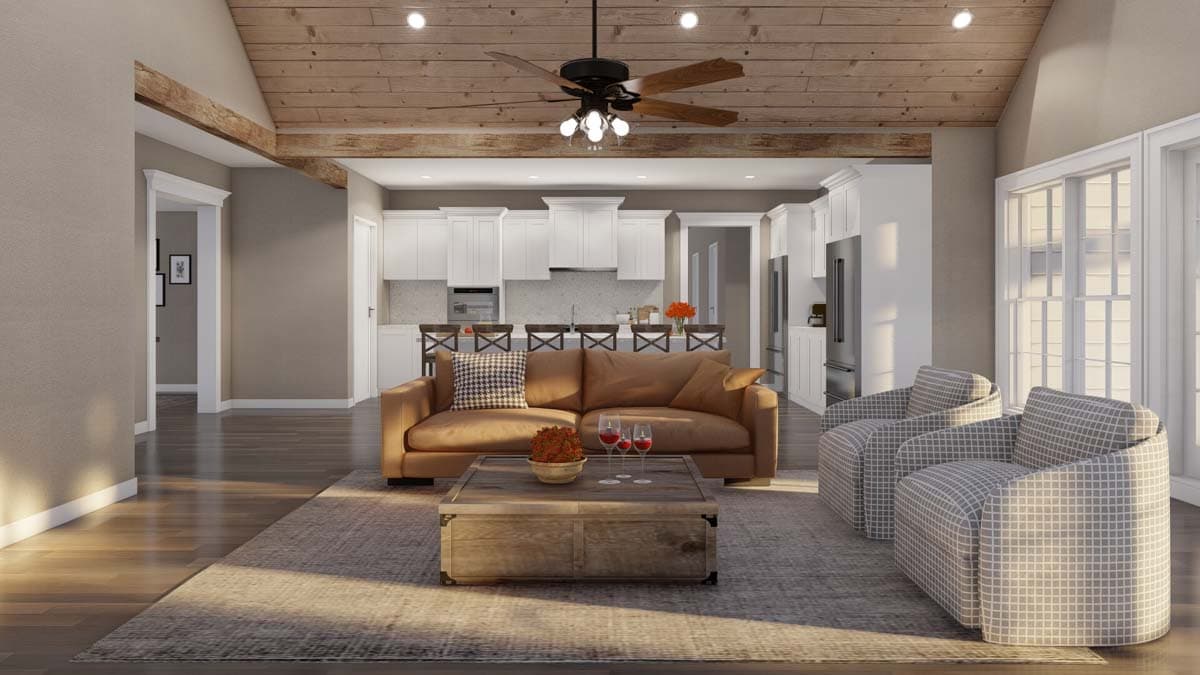 Interior rendering showing an open-concept living area and kitchen with vaulted wood ceilings, exposed beams, and a large island.