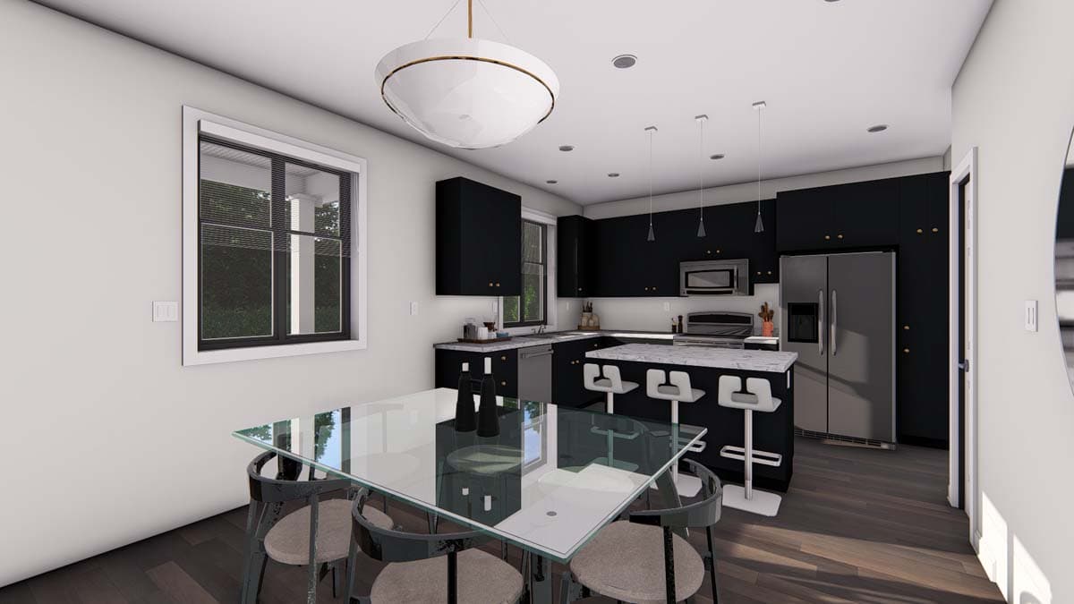 Kitchen and dining area with black cabinets, island, glass dining table, and stainless steel appliances.
