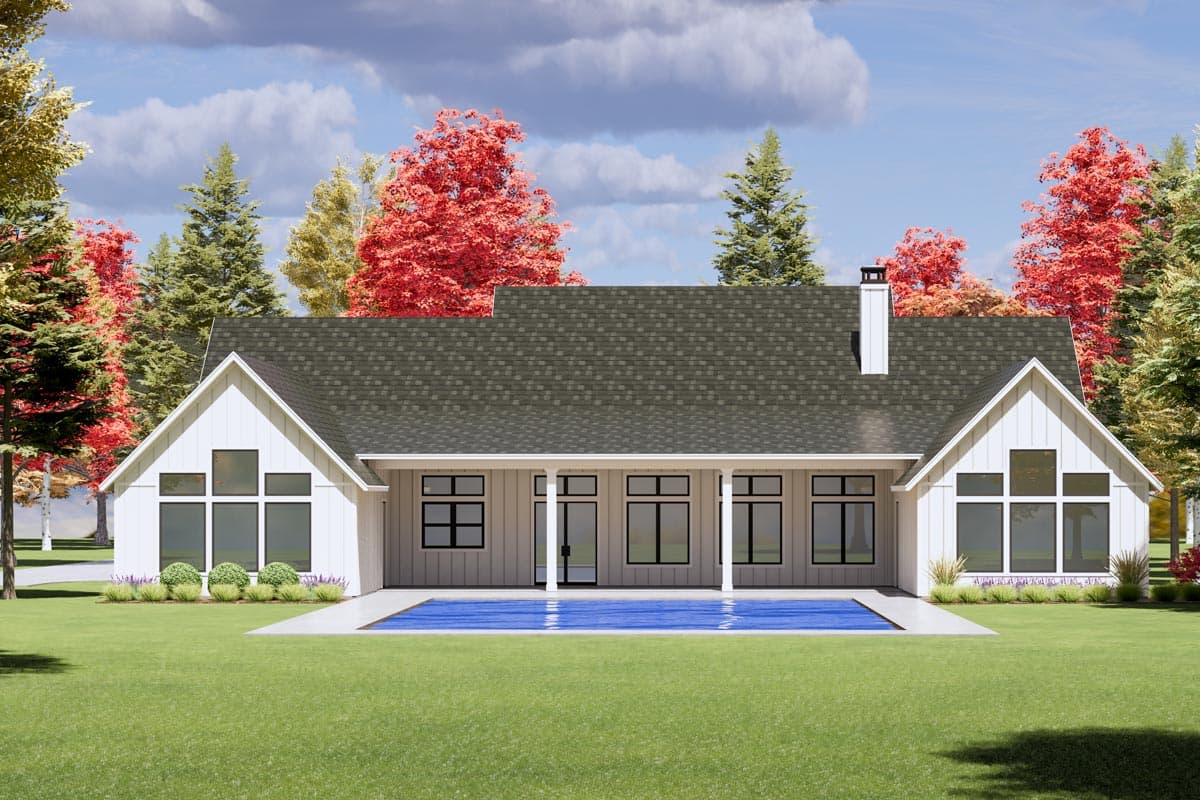 Modern Farmhouse style house plan exterior with gables, covered porch, chimney, and large windows.