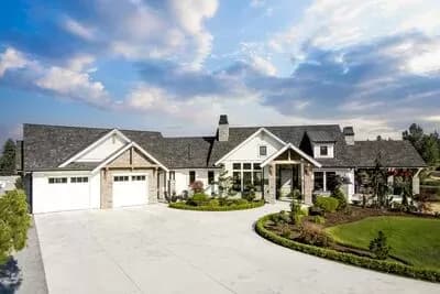 4-Bed Modern Farmhouse Plan with Angled and Lower Level Garages - 3224 Sq Ft