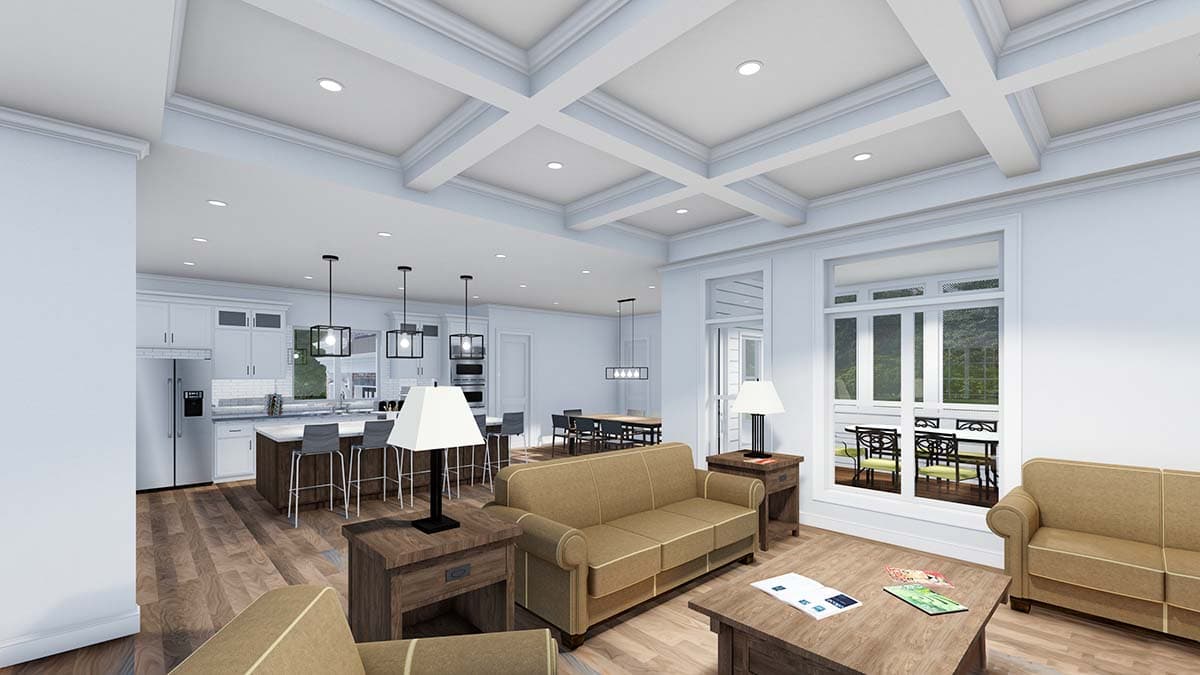 Great room and kitchen with coffered ceiling, island, and large windows. Dining area visible.