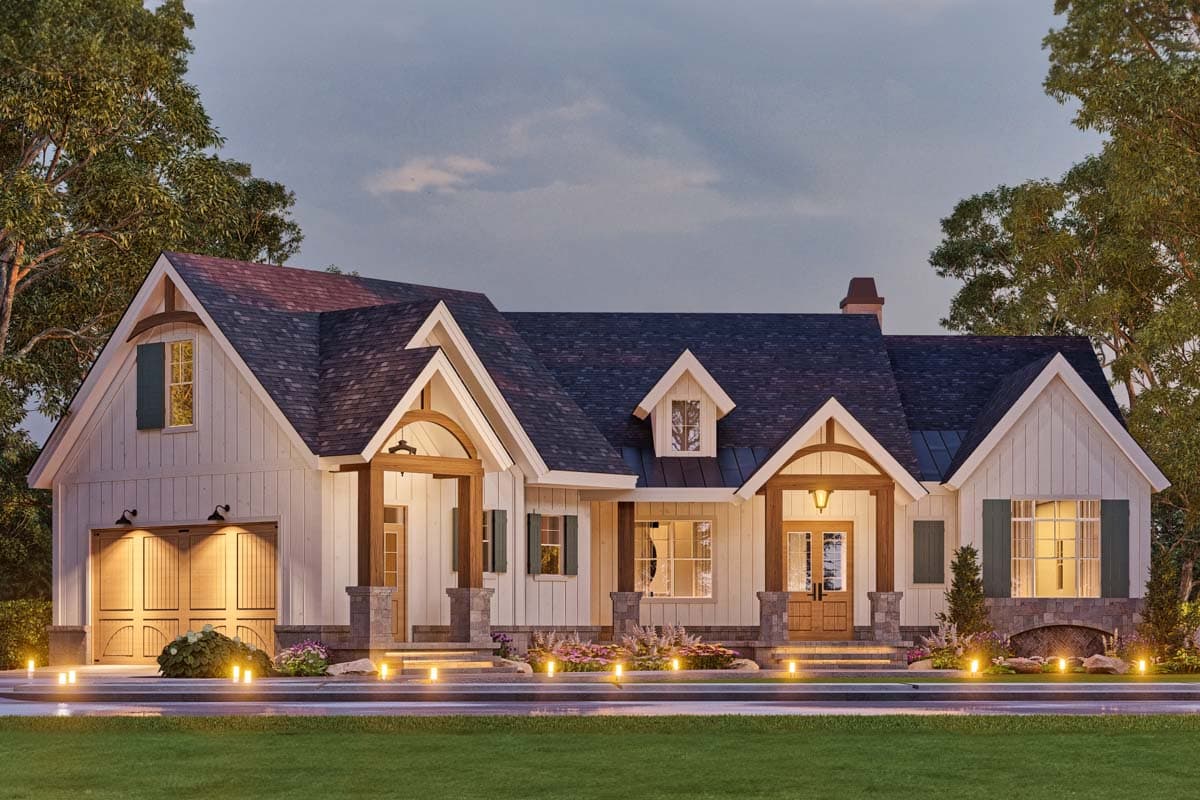 Modern Farmhouse house plan exterior with gabled dormers, arched porch supports, stone accents, and a side-entry garage.