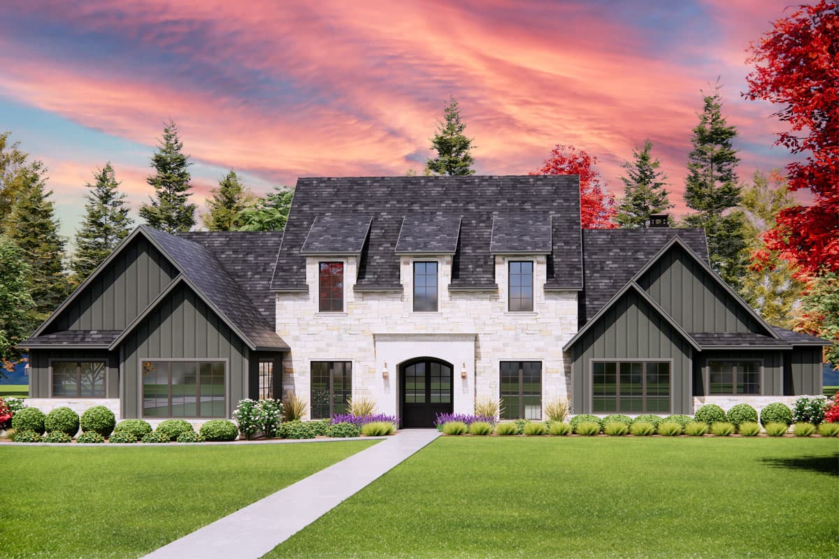 House plan exterior. Two-story home with stone facade and gabled roof. Features include dormers, dark trim, and a covered entry. Landscaped yard.