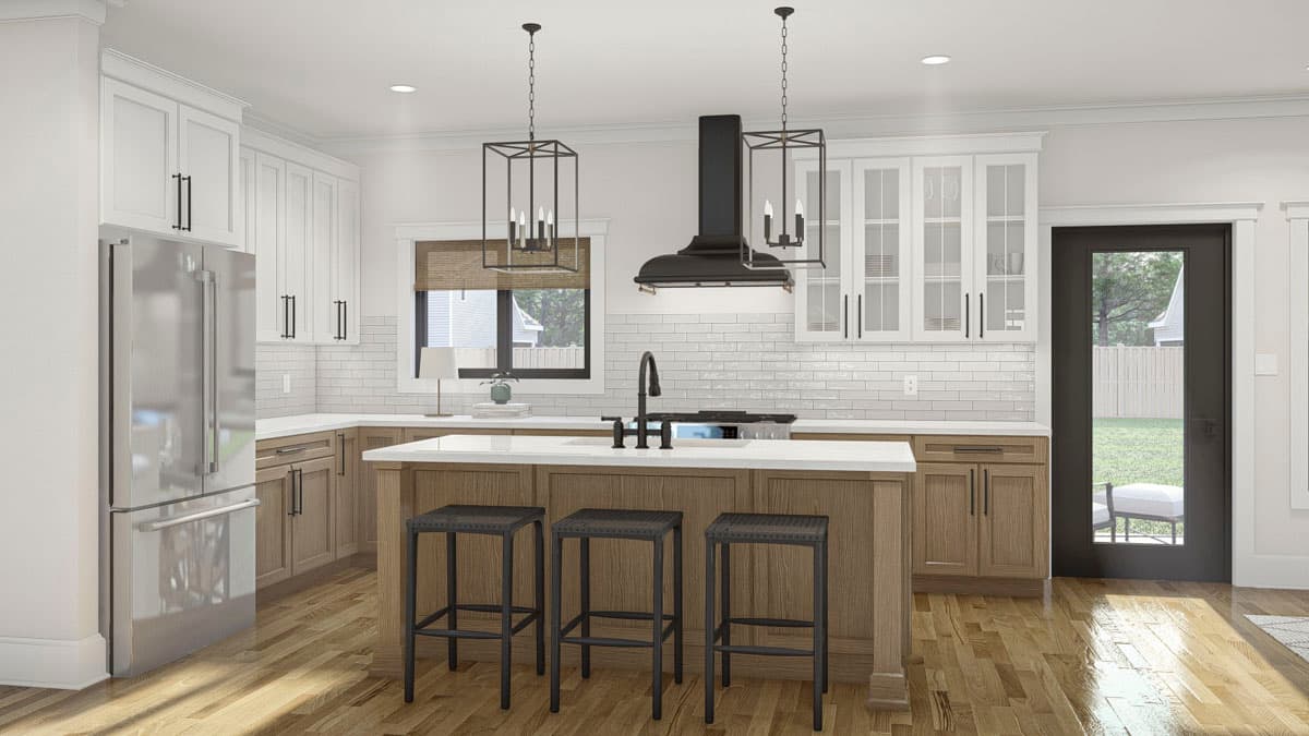 Modern kitchen with island, stainless steel refrigerator, white shaker cabinets, wood lowers, and subway tile backsplash.