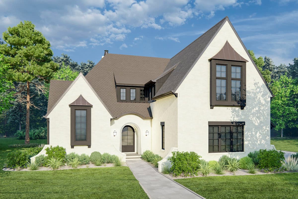 House plan exterior. Two-story Tudor style home with gabled roof, dark-trimmed windows, arched entry, and decorative dormer.